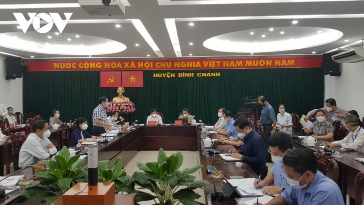 Deputi Perdana Menteri Vu Duc Dam Lakukan Pemeriksaan Pencegahan dan Penanggulangan Pandemi Covid-19 di Kota Ho Chi Minh - ảnh 1