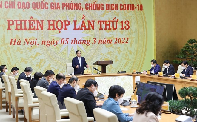 PM Pham Minh Chinh Usulkan Daerah, Instansi dan Kementerian untuk Satukan Langkah-langkah Pengarahan Pencegahan dan Penanggulangan Pandemi COVID-19. - ảnh 1