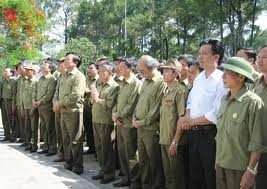 Activities pay tribute to war invalids and martyrs - ảnh 1