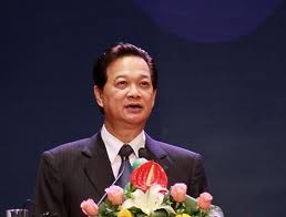 PM Nguyen Tan Dung chairs government monthly meeting - ảnh 1