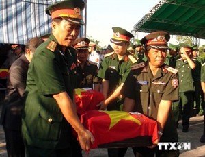 Traditional day of Vietnamese volunteer soldiers marked in Vientiane - ảnh 1