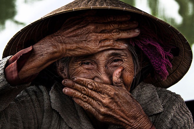 Senyuman orang Vietnam di  lensa fotografer asing - ảnh 4