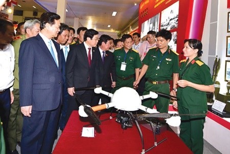 Exhibition on 70 years of social economic achievements - ảnh 1