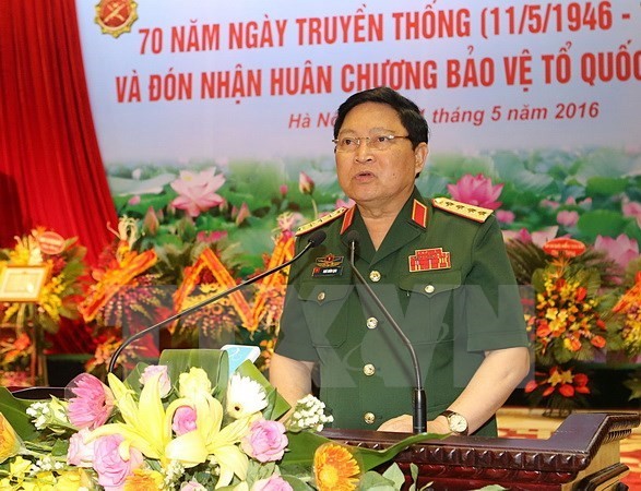 Defense minister pays official visit to Laos, attends ADMM-10 - ảnh 1