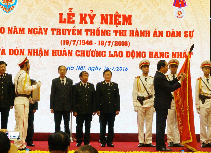 President Tran Dai Quang attends 70th founding anniversary of the Civil Judgment Execution - ảnh 1