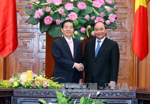 PM receives Chinese Minister of Public Security, Deputy Chief of Indonesia’s National Police  - ảnh 1