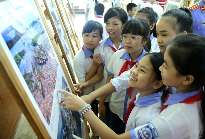 Photo, documentary exhibition features ASEAN Community - ảnh 1