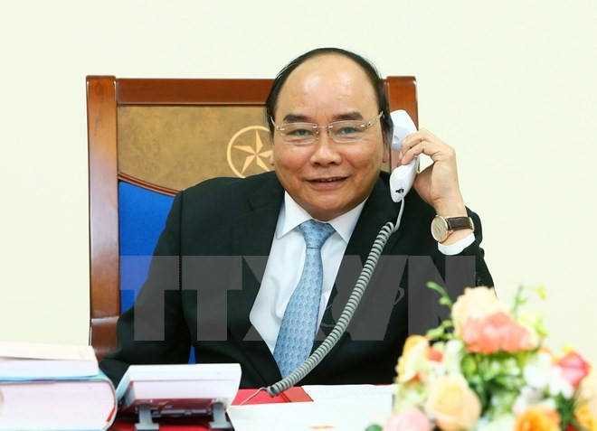 Prime Minister Nguyen Xuan Phuc talks with US President-elect Donald Trump - ảnh 1