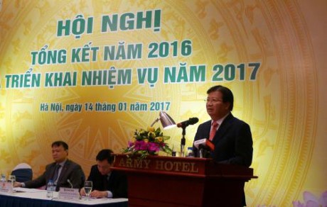 Corporate restructuring to promote investment and production  - ảnh 1