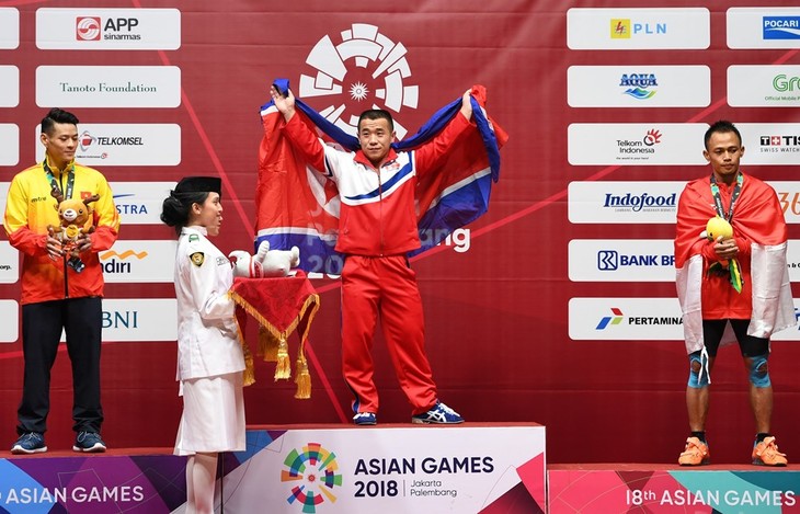 Vietnam wins first silver medal at ASIAD 2018 - ảnh 1