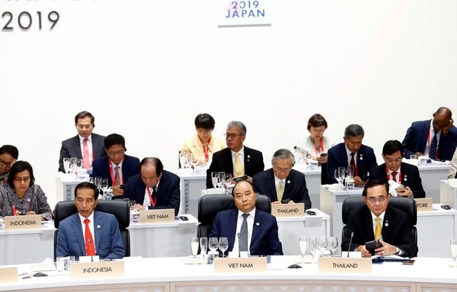 PM Nguyen Xuan Phuc attends G20 Summit sessions - ảnh 1