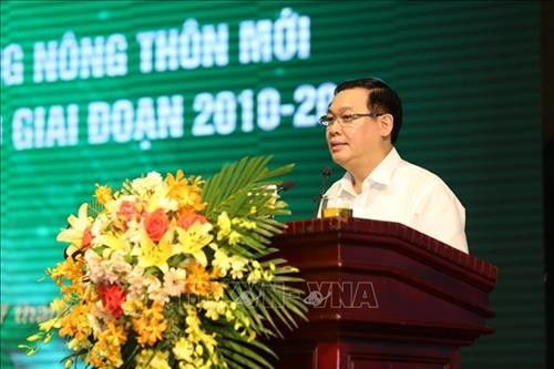 Conference held to review the national target program on new rural areas - ảnh 1
