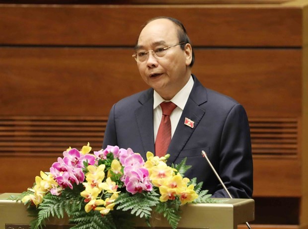 Politburo member Nguyen Xuan Phuc elected State President - ảnh 1