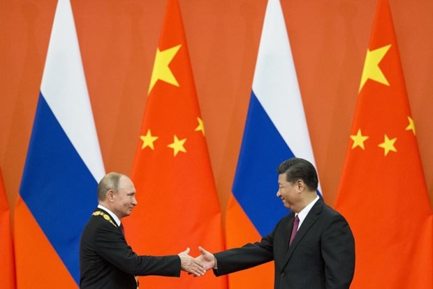 Putin, Xi meet on sideline of SCO summit - ảnh 1