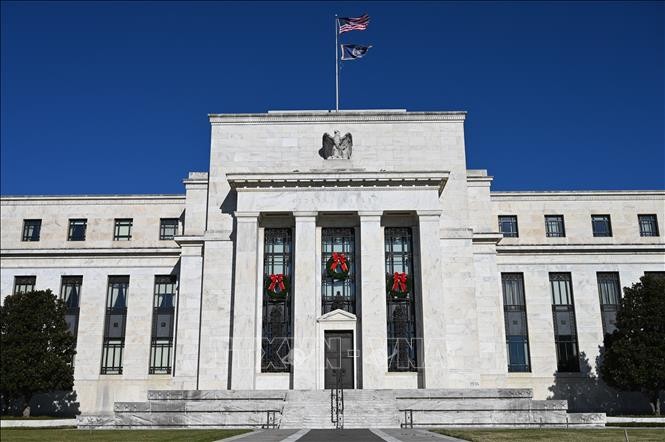 FED hikes interest rate 0.25 point - ảnh 1