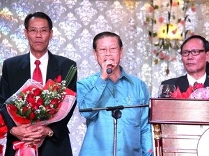 Un vice-Premier ministre laotien assiste au Têt vietnamien à Kham Muon - ảnh 1