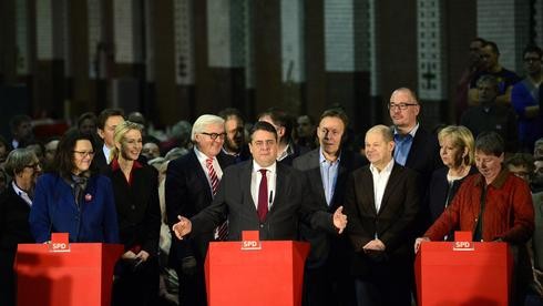 La base du SPD valide l'accord de coalition avec Angela Merkel  - ảnh 1
