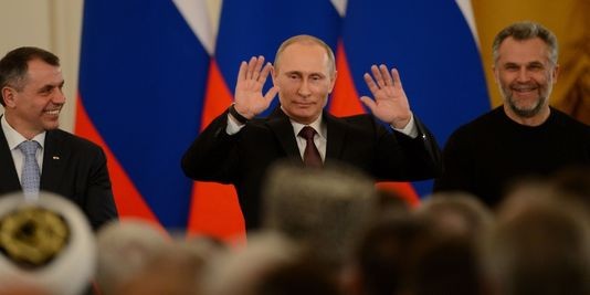 Vladimir Poutine défend le rattachement de la Crimée à la Russie  - ảnh 1