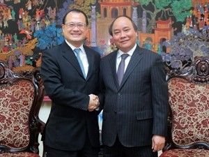 Le vice-PM Nguyen Xuan Phuc reçoit le président du groupe Sunwah - ảnh 1
