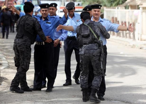 Irak: le vote des forces de sécurité endeuillé par des attentats, 57 morts - ảnh 1