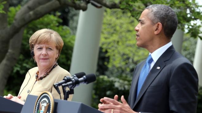 Ukraine : Obama et Merkel menacent la Russie de sanctions plus sévères - ảnh 1