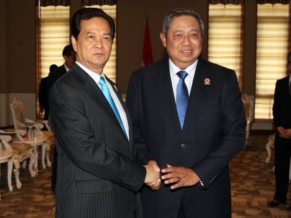 Le PM Nguyen Tan Dung rencontre les présidents birman et indonésien - ảnh 1