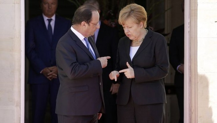 Ukraine : Merkel et Hollande veulent que Poutine calme le jeu - ảnh 1