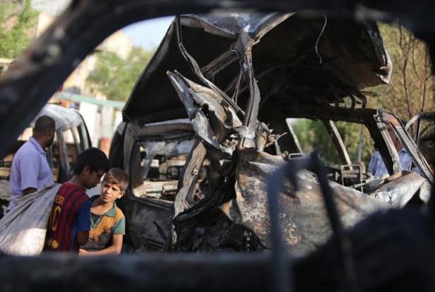 Bagdad : 23 morts lors de l'explosion d'une voiture piégée  - ảnh 1