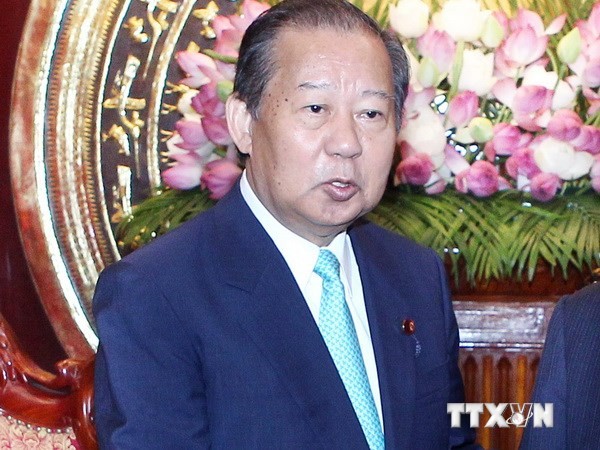 Le président de l’Union d’amitié des parlementaires Japon-Vietnam reçu par To Huy Rua - ảnh 1