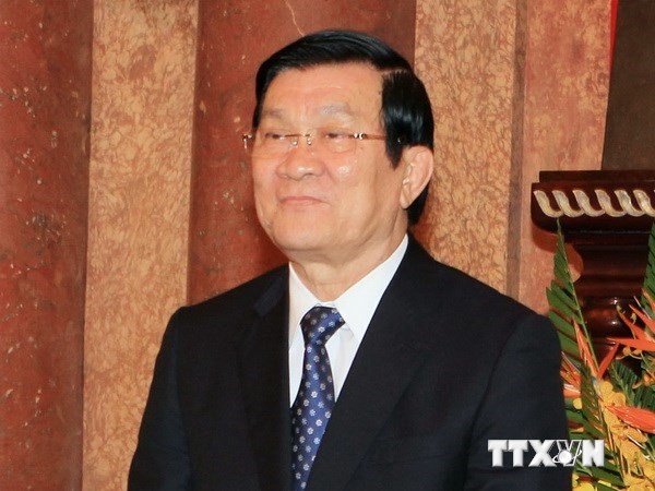 Le président Truong Tân Sang arrivé en Chine pour le sommet de l’APEC - ảnh 1