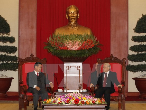 Un vice Premier Ministre laotien reçu par le leader du PCV - ảnh 1