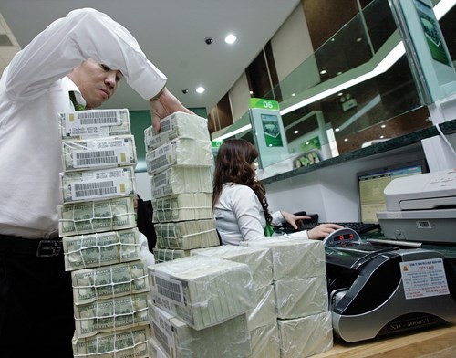 La Banque d’Etat s’engage à maintenir le taux de change VND-USD - ảnh 1