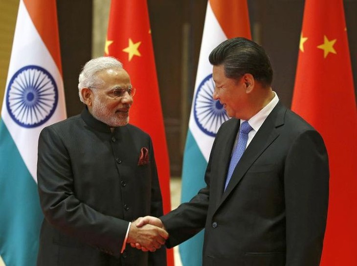 Le président chinois rencontre le Premier ministre indien - ảnh 1