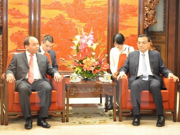 Nguyen Xuan Phuc rencontre le Premier ministre chinois - ảnh 1