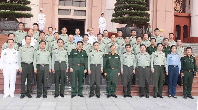 Une délégation de l’Université de la défense nationale de Chine reçue par Phung Quang Thanh - ảnh 1