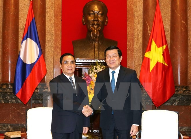 Thongsing Thammavong  reçu par les dirigeants vietnamiens - ảnh 1