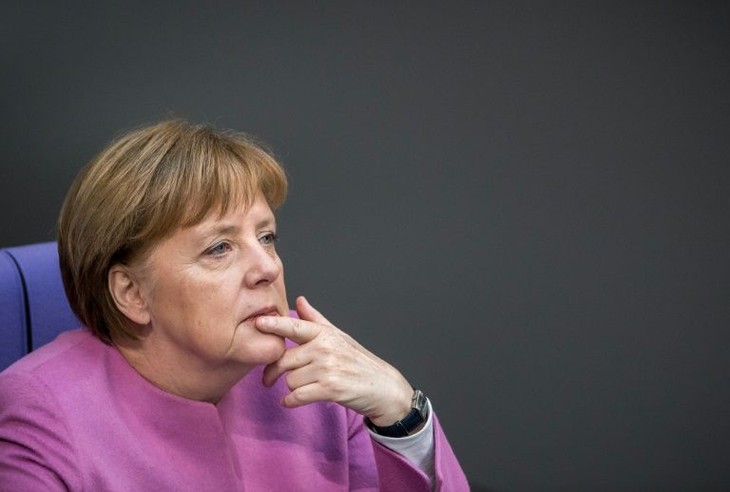 Merkel voit pour la première fois une chance de régler la crise migratoire - ảnh 1
