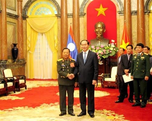 Tran Dai Quang reçoit des responsables laotien et cubain - ảnh 1
