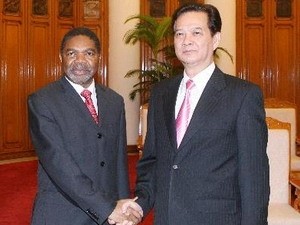 Presiden Vietnam Truong Tan Sang menerima Presiden zona semi otonomi Zanziar dari Tanzania. - ảnh 2