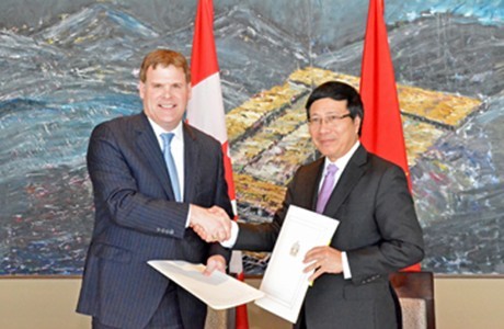 Deputi Perdana Menteri, Menlu Vietnam, Pham Binh Minh melakukan kunjungan resmi di Kanada - ảnh 1