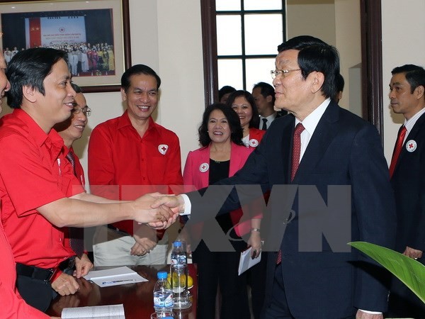 Presiden Truong Tan Sang melakukan temu kerja dengan Pengurus Besar Lembaga Palang Merah Vietnam - ảnh 1