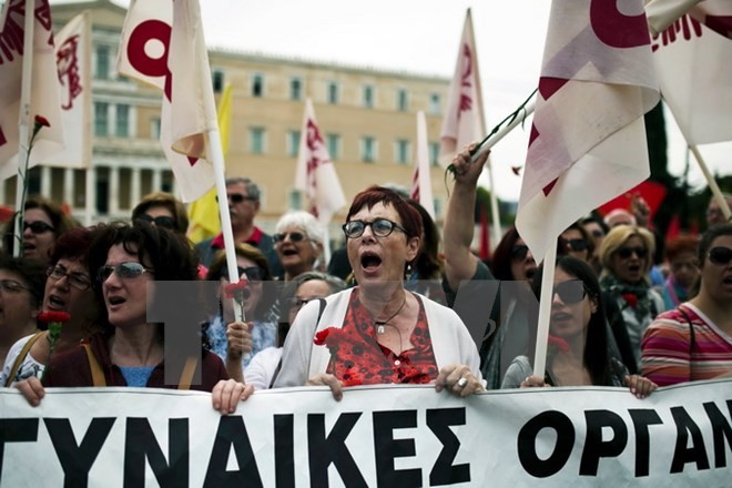 Eurozone mengarah ke permufakatan mengurangi utang Yunani - ảnh 1