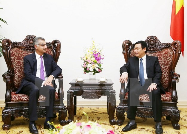 Bank Standard Chartered akan terus membantu Vietnam dalam masalah-masalah ekonomi - ảnh 1