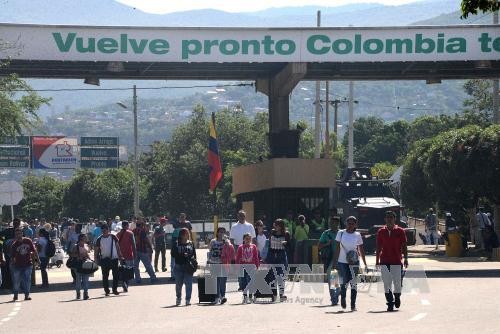 Venezuela dan Kolombia membuka kembali koridor perbatasan - ảnh 1