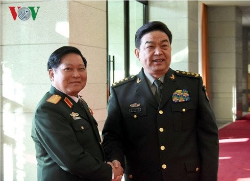 Menteri Pertahanan Vietnam dan Tiongkok bertekad membawa hubungan antara dua negara ke ketinggian baru - ảnh 1