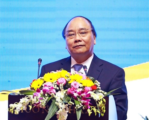 PM Nguyen Xuan Phuc menghadiri Konferensi promosi investasi di provinsi Quang Nam - ảnh 1