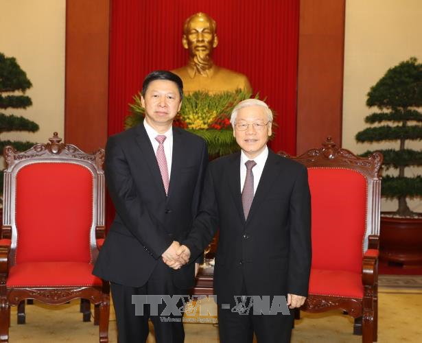 Sekjen Nguyen Phu Trong menerima Song Tao, Utusan Khusus Sekjen Partai Komunis Tiongkok, Xi Jinping - ảnh 1