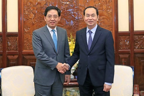 Presiden Tran Dai Quang menerima Duta Besar Tiongkok sehubungan dengan akhir masa baktinya - ảnh 1