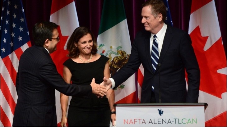 Semua pihak mempertahankan laju dalam perundingan kembali NAFTA - ảnh 1