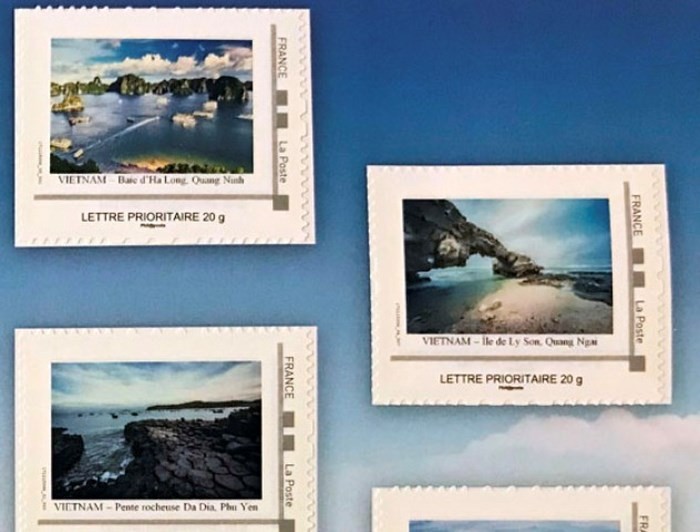 Mahasiswa Viet Nam di Perancis dengan perangko bergambarkan laut dan pulau kampung halaman - ảnh 1